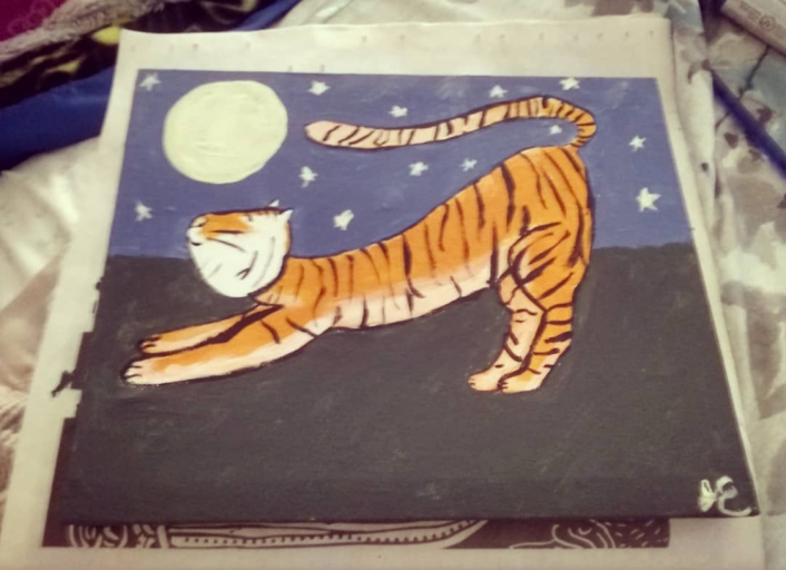 A painting of a tiger stretching under a full moon.