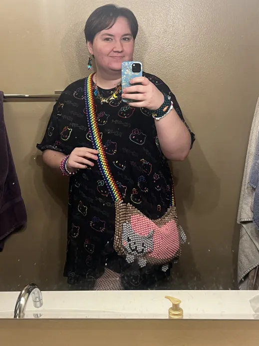 Jess modeling the Nyan Cat purse