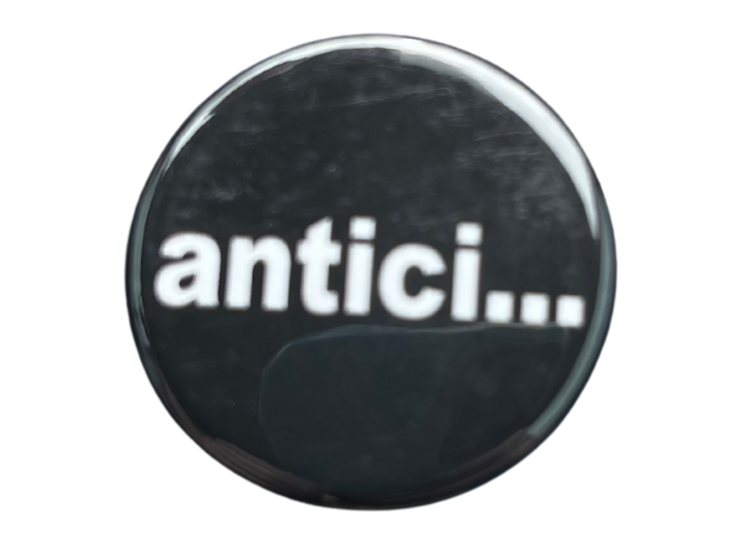 A black button that reads: antici...
