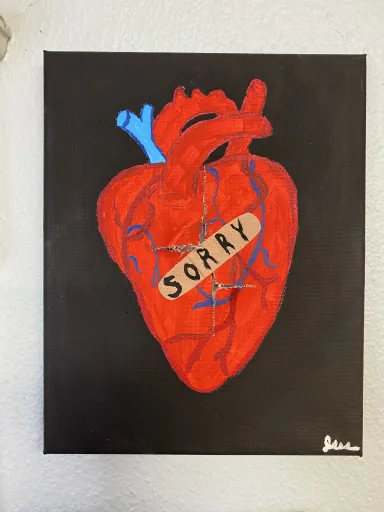 A painting of an anatomically correct human heart. The canvas is torn in the center of the heart. A bandage covers the tear and has the word 'Sorry' written on it.
